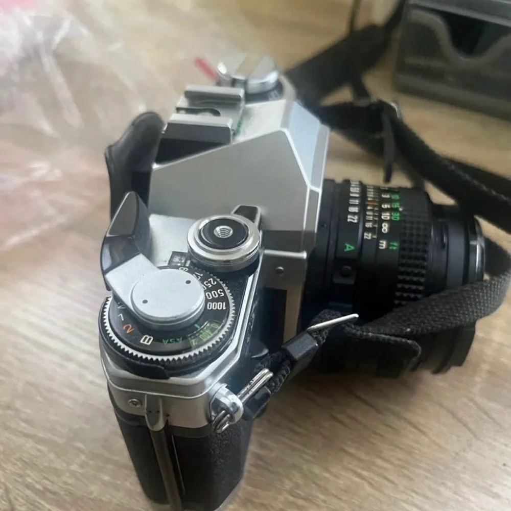 Canon AE-1 35mm Film Camera + 50mm + 70–210mm Lens Bundle